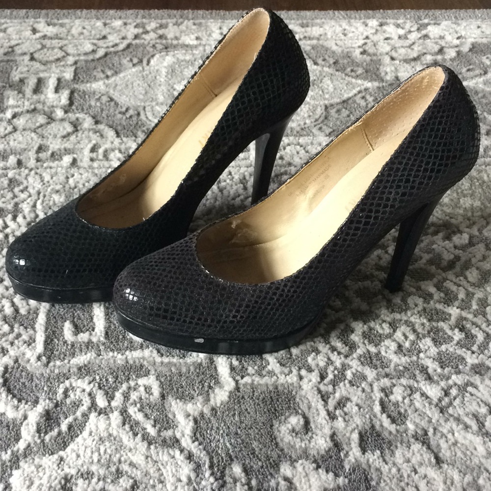 Black platform pumps